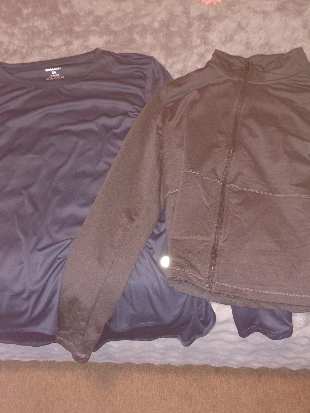 Black Zip-Up Jacket and Navy Base Layer Top